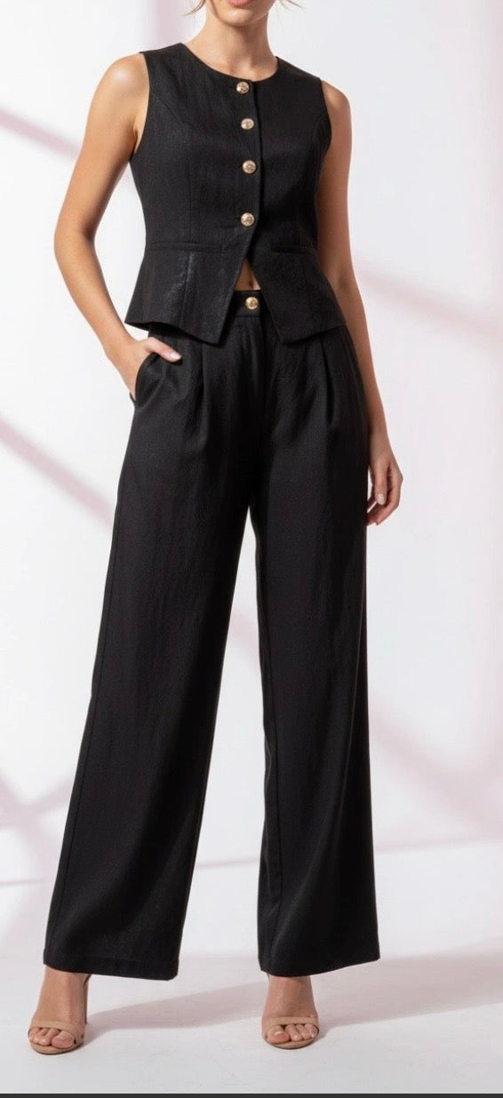 Completo nero con gilet e pantalone palazzo