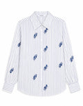 Camicia rigata con ricami floreali in paillettes