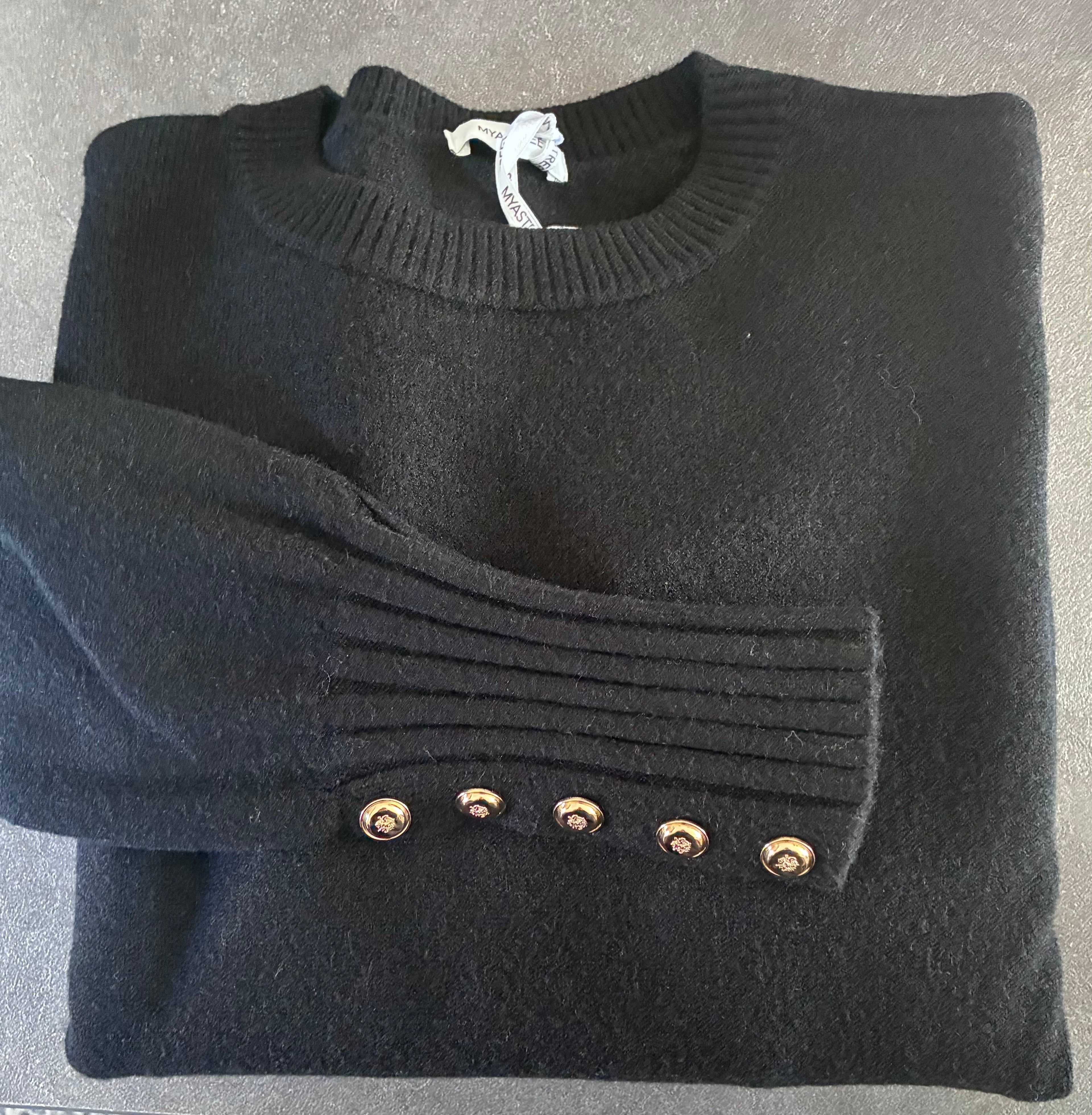 Maglione panna con bottoni ai polsini