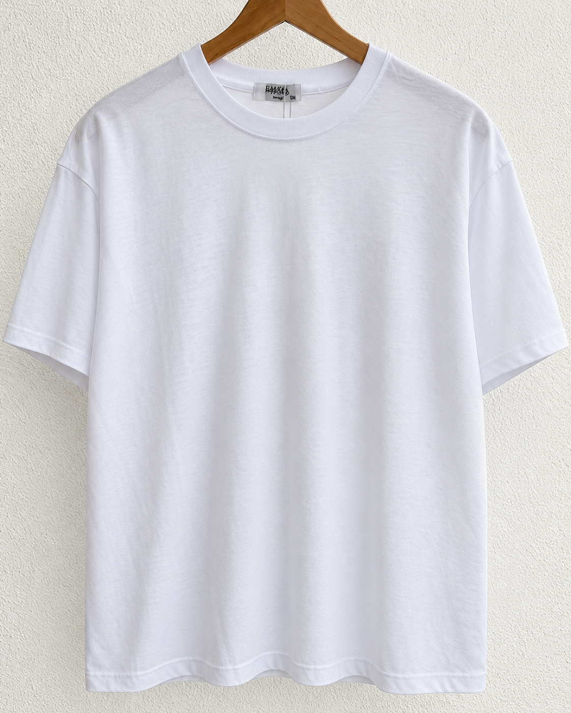 T-shirt oversize con spalline